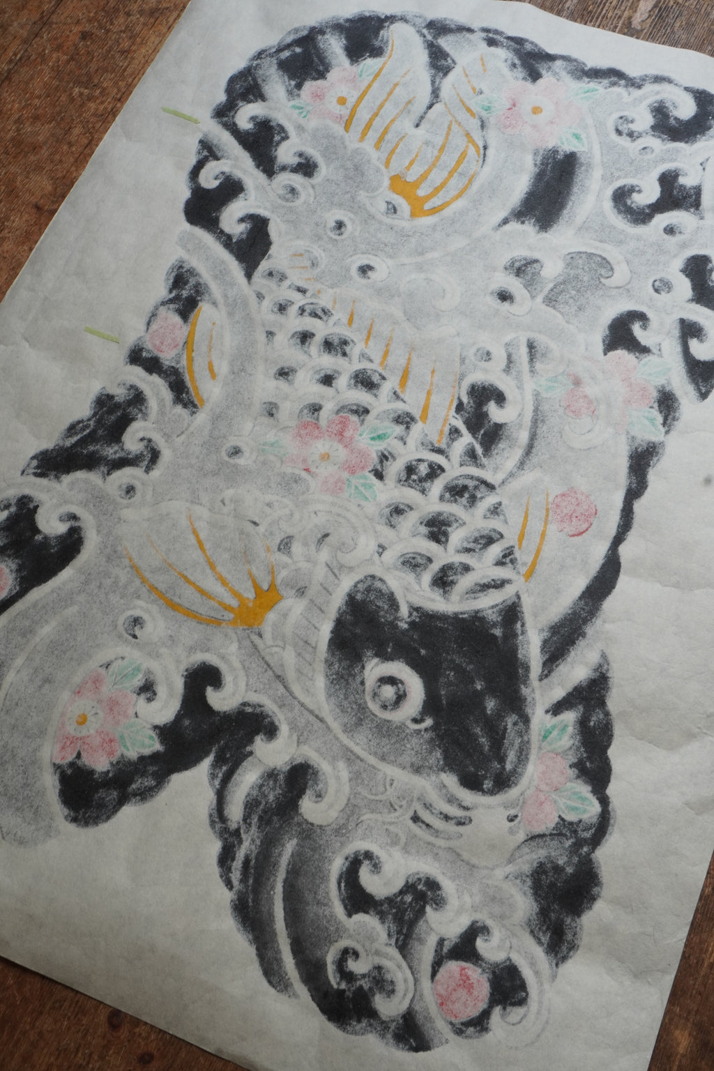 Original Japanese Koi fish painting on textured, fiber-rich Kozo paper. The artwork features a traditional Japanese Irezumi tattoo style Koi fish swimming down stream symbolising overcoming perserverance.