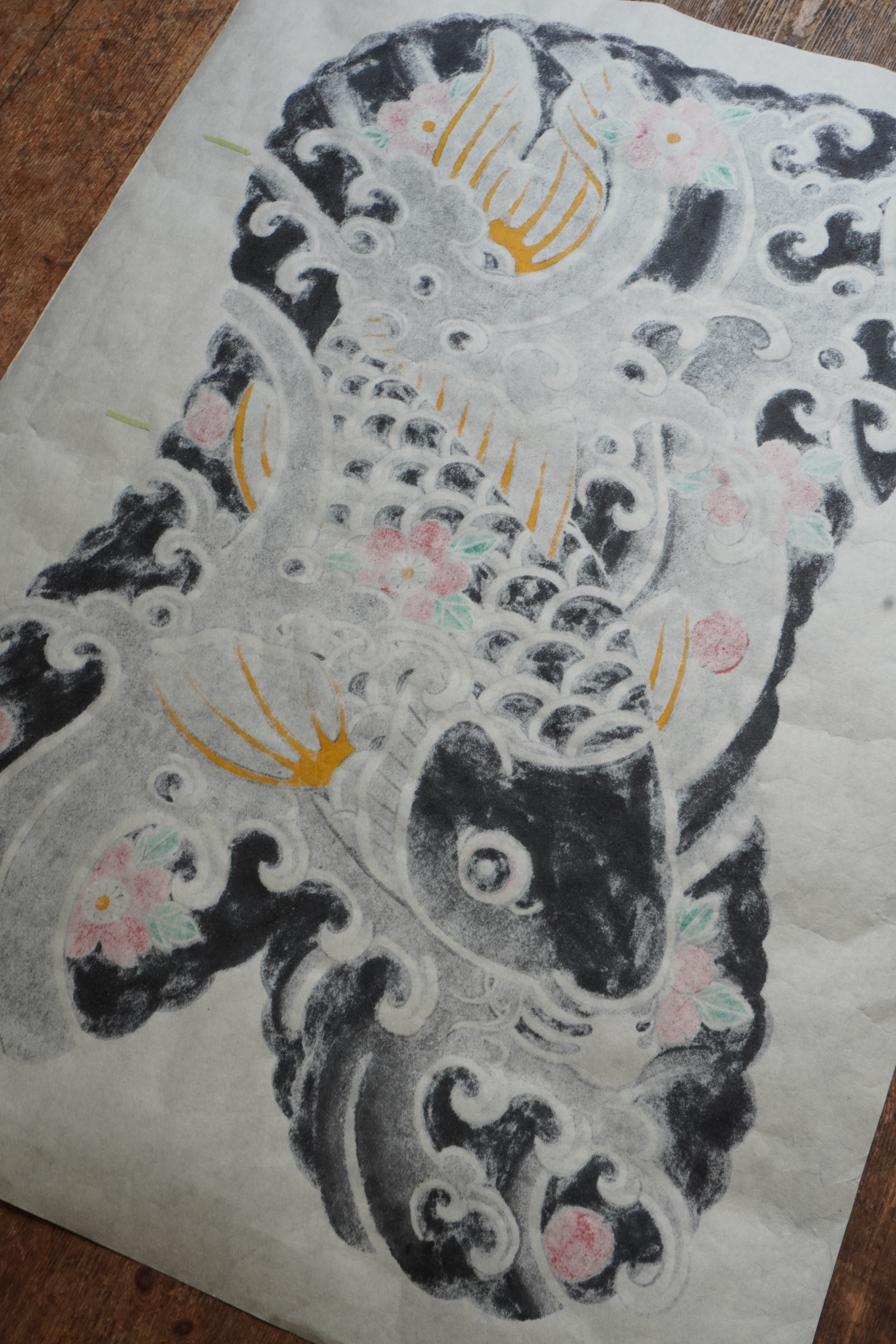 Original Japanese Koi fish painting on textured, fiber-rich Kozo paper. The artwork features a traditional Japanese Irezumi tattoo style Koi fish swimming down stream symbolising overcoming perserverance.