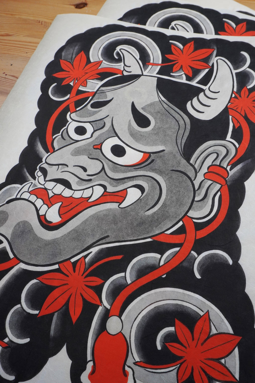Hannya mask art print on traditional Kozo paper, featuring a detailed Japanese demon mask inspired by Noh theatre, folklore, and traditional irezumi tattoo art.
