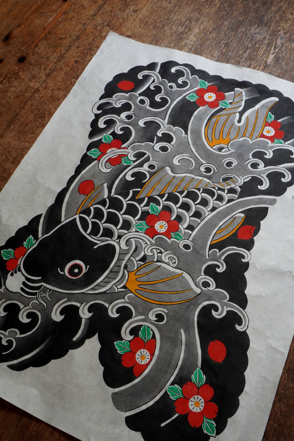 Original Japanese Koi fish painting on textured, fiber-rich Kozo paper. The artwork features a traditional Japanese Irezumi tattoo style Koi fish swimming down stream symbolising overcoming perserverance.