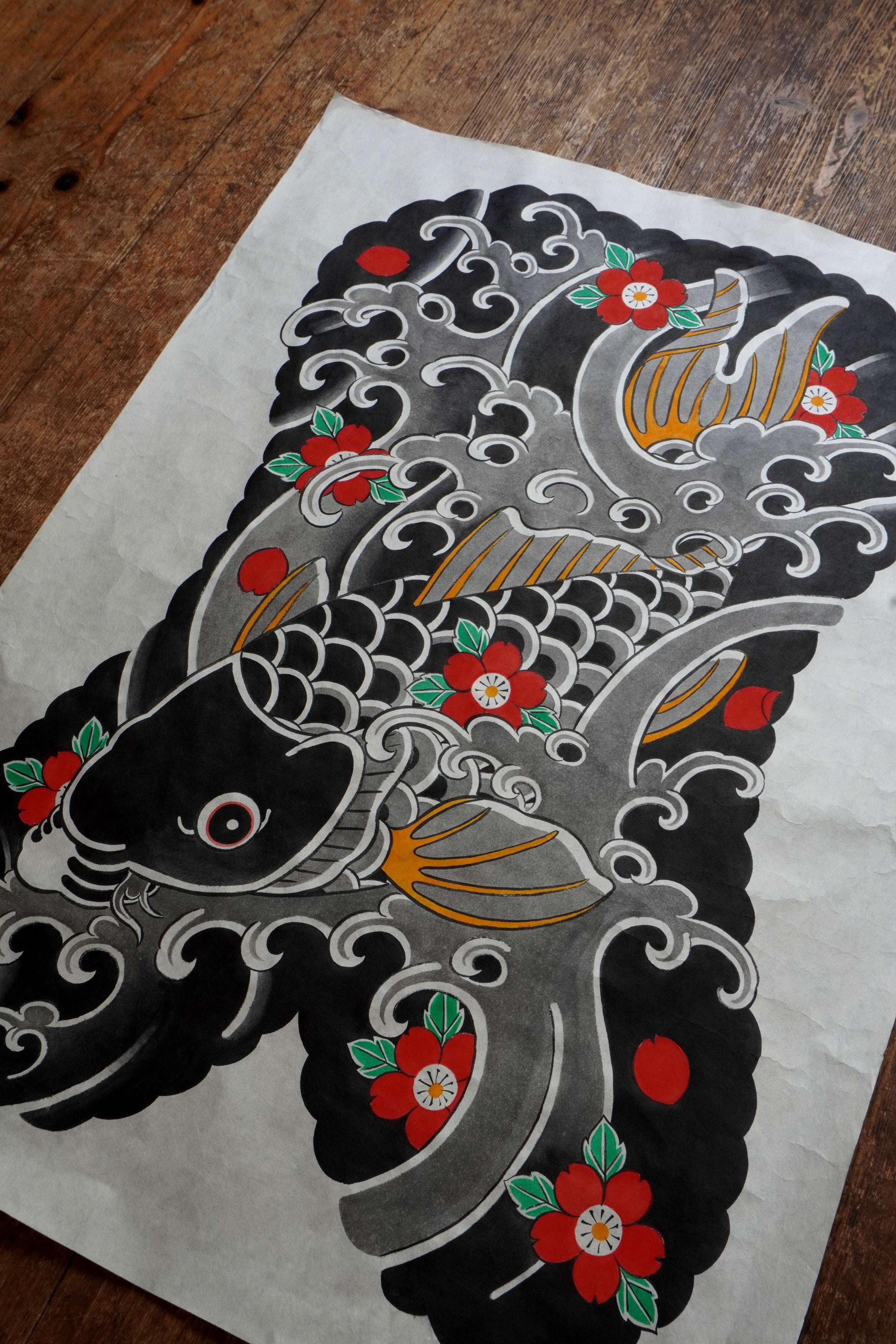 Original Japanese Koi fish painting on textured, fiber-rich Kozo paper. The artwork features a traditional Japanese Irezumi tattoo style Koi fish swimming down stream symbolising overcoming perserverance.